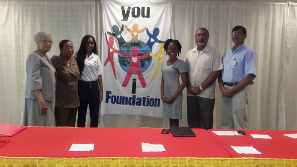 From left: Chairperson of the event alongside National Director, Community Development Council Ms. Philomena Sahoye; President of the You and I Foundation Ms. Michelle Bristol; Child Protection Agency official Ms. Teresa Gaime; Mr. Nazim Hussain, National Aids Programme Secretariat (NAPS) official and Dr. Bhiro Harry of the Georgetown Public Hospital Corporation