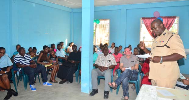 Assistant Commissioner of Police, Christopher Griffith delivers his address