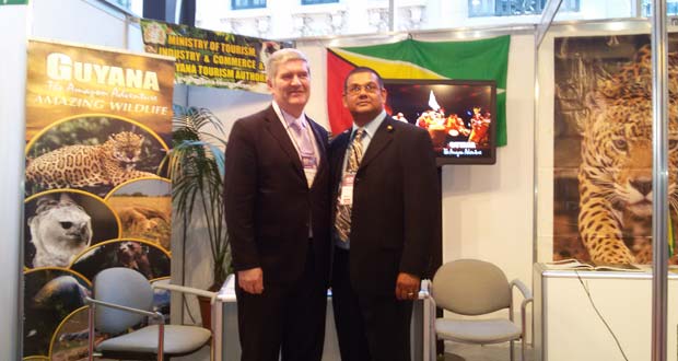 Under-Secretary for Quality at the Argentine Tourism Ministry,  Mr. Gonzalo Casanova Ferro (left), and Director of the Guyana Tourism Authority (GTA), Mr. Indranauth Haralsingh, at the Guyana booth