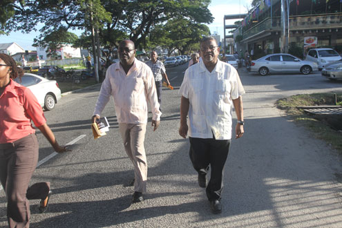 IMG 9833: Minister of Labour, Dr. Nanda Gopaul (right) and FITUG President, Mr Carvil Duncan on the WFTU Action Day march