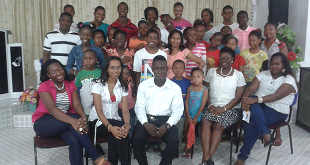 University of Guyana (UG) Final year social work students alongside 3rd year Environmental Studies students pose with youths of the Paradise Assembly of God Church Youth Ministry that took part in their ‘Community Practice’ project.
