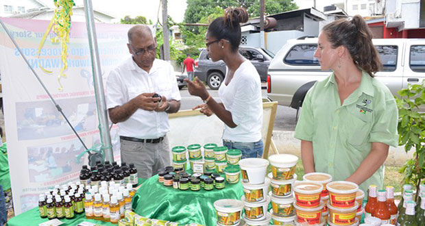 Agriculture Minister, Dr Leslie Ramsammy inspecting local agro-processed products