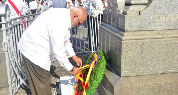 FLASHBACK: President Donald Ramotar placing a wreath at the foot of the cenotaph last Armistice Day