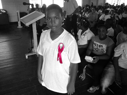 In honour of Breast Cancer Awareness Month, 11-year-old Grade 6 pupil Akeem Boyce of the Josel Education Institute proudly shows his Breast Cancer Solidarity Ribbon