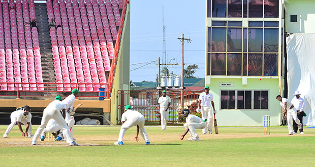 Jaguars on the attack! The fielders around the bat of the Volcanoes’ Lyndon James, certainly underlined the support that was given to Guyana Jaguars’ left arm spinner Veerasammy Permaul (2nd right) who sent down another delivery during his marathon bowling spell yesterday (Photo by Adrian Narine)