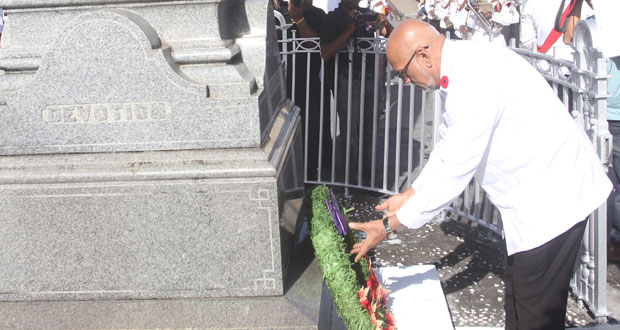 President Donald Ramotar places his wreath at the base of the cenotaph (Photo by Sonell Nelson)