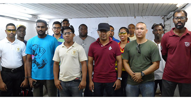 The top three shooters in both senior and junior categories (in front row) with other competitors at the TSU Range at Eve Leary.