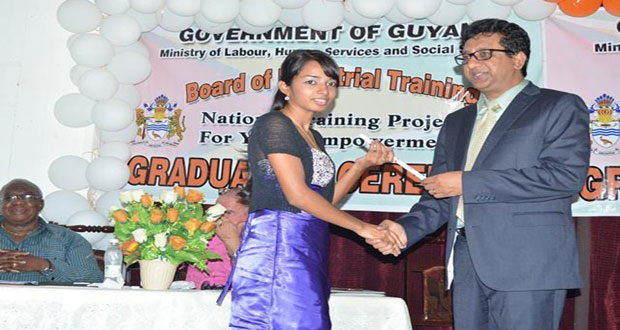 Attorney-General (AG) and Minister of Legal Affairs, Anil Nandlall hands a certificate to one of the graduates