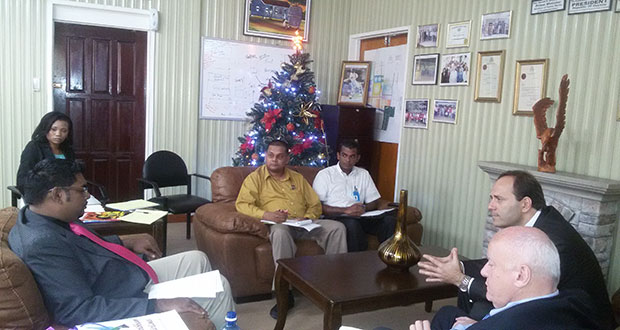 Caribbean Airlines executives during the meeting at the Ministry of Housing