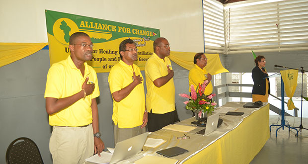 From left, AFC General Secretary, David Patterson; AFC Leader, Khemraj Ramjattan; AFC Chairman, Nigel Hughes; and AFC Vice Chairman, Moses Nagamootoo, with Chairperson of the Congress, Valarie Lowe at podium