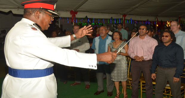 The First Family seemingly had the time of their lives last evening as they obeyed the every command of Bandmaster, Assistant Commissioner, Mr Cecil Bovell (Photo by Cullen Bess-Nelson)