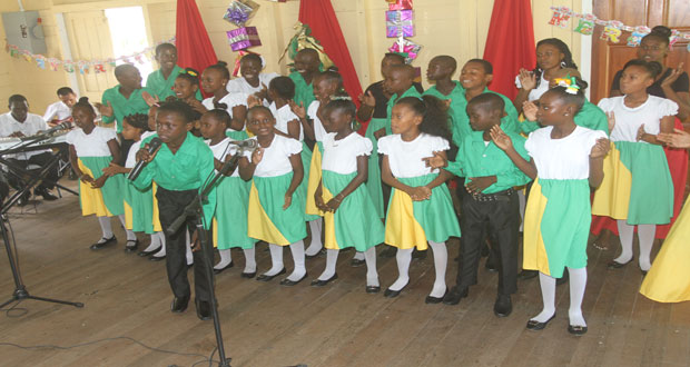A Rosemary Lane group renders a song at their Christmas party