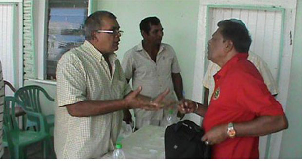 A farmer interacting with Minister Alli Baksh after the meeting at Success, Wakenaam on Sunday