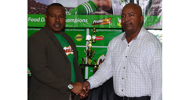 A gentleman’s agreement! Petra Organisation Co-Director Troy Mendonca (left) and Chase Academy Headmaster Henry Chase (Adrian Narine photo)