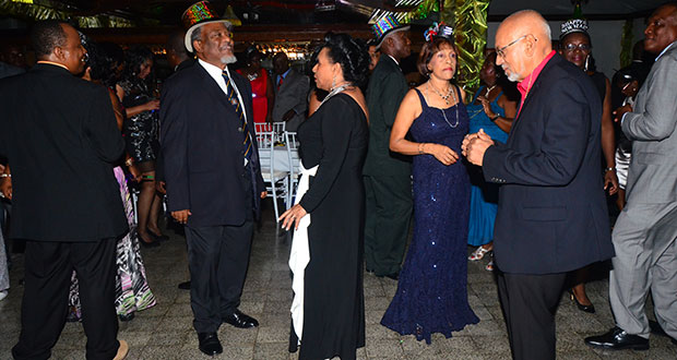 President Donald Ramotar and First Lady Deolatchmee Ramotar with Prime Minister Samuel Hinds and Mrs Hinds enjoying the moment.