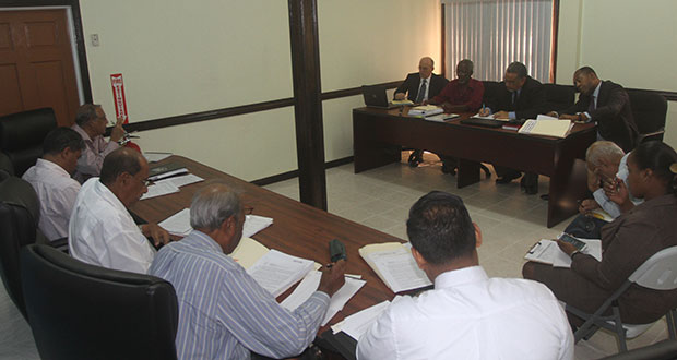 Left: Representatives of the PUC and GT&T at the hearing of the company’s request for an increase in landline rates in the conference room of PUC on Wednesday