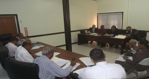 Members of the PUC and GT&T at the previous hearing