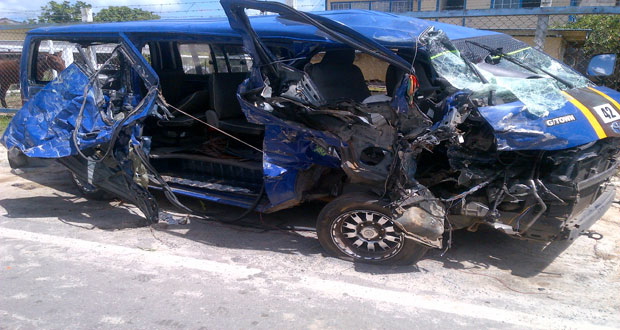 The mangled minibus at the Grove Police Station