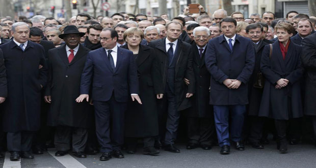 French President Francois Hollande is surrounded by Heads of state including (LtoR) Israel's Prime Minister Benjamin Netanyahu, Mali's President Ibrahim Boubacar Keita, Germany's Chancellor Angela Merkel, European Council President Donald Tusk, Palestinian President Mahmoud Abbas, Italy's Prime Minister Matteo Renzi and Switzerland's President Simonetta Sommaruga as they attend the solidarity march (Marche Republicaine) in the streets of Paris yesterday. 
Credit: Reuters/Philippe Wojazer