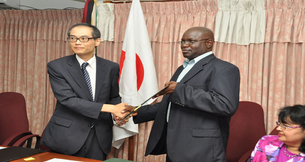 Special Needs for Life Inc., Chief Executive Officer Mark Adams (right) receiving the grant from First Secretary of the Embassy of Japan Takaaki Kato