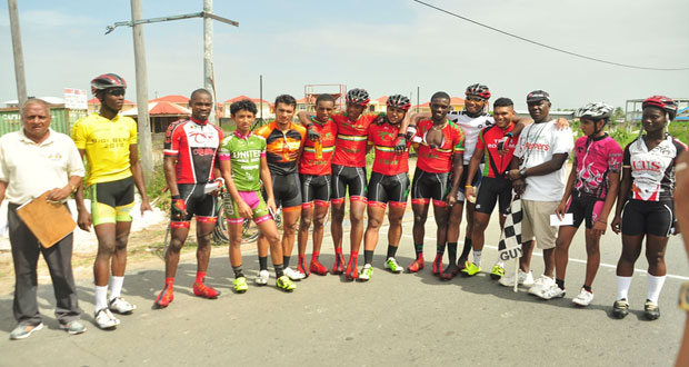Prize winners of the various categories of the annual NSC 40-mile cycle road race strike a pose with race organiser Hassan Mohamed yesterday.