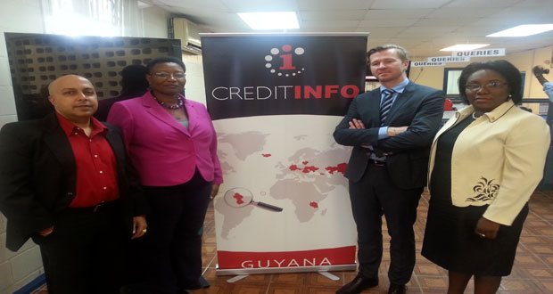 Senior officials of GWI and CreditInfo Guyana.