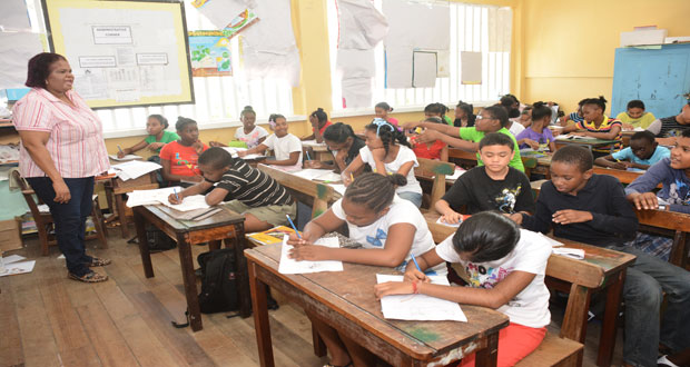 St. Margaret’s Primary School students and teacher in full preparation mode for their exams yesterday (Samuel Maughn photos)