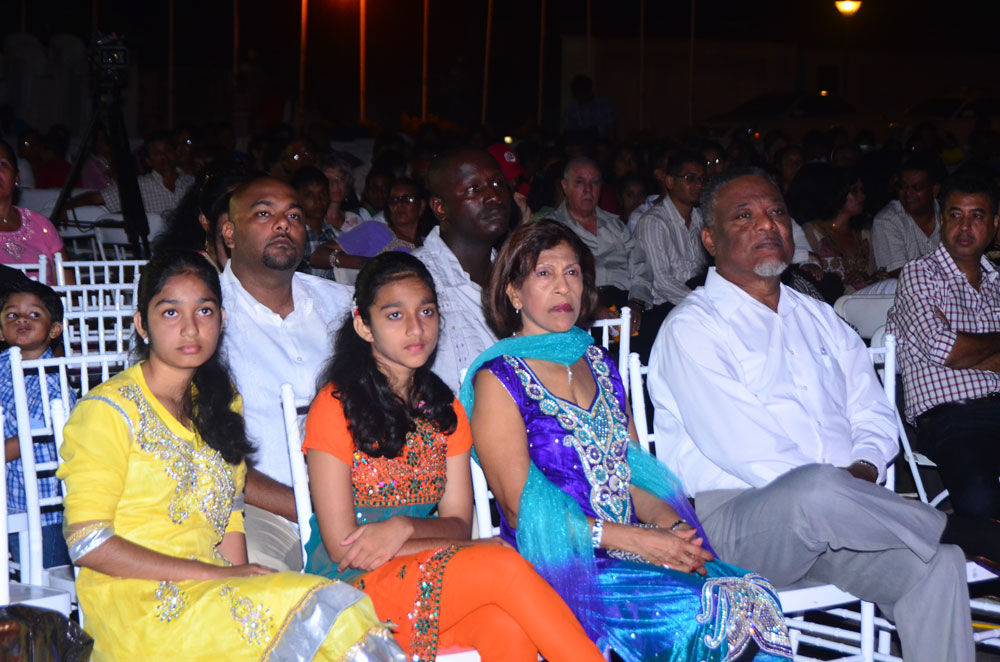 Prime Minister Samuel Hinds and First Lady Deolatchmee Ramotar pay rapt attention to one of the cultural performances