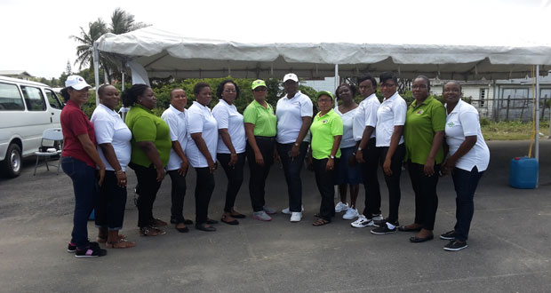 Senior Superintendent Maxine Graham (with cap, centre) and other members of the Guyana Association of Women Police pose for the Chronicle yesterday