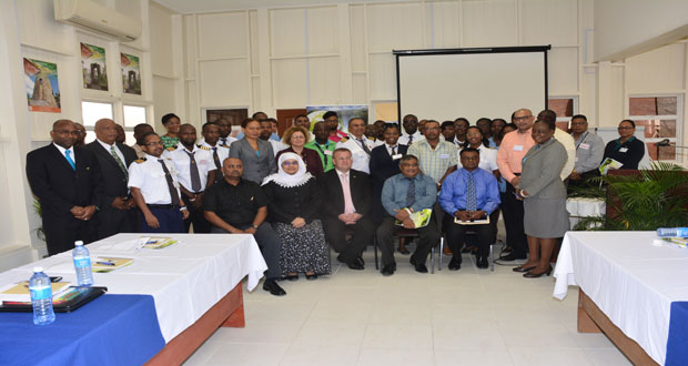 CARICOM, EU, GRA and other officials with customs and border- control officers pose for a group photograph following the opening of the workshop yesterday