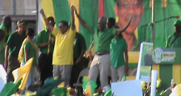 David and Moses cavorting on stage to the applause of supporters at the Anna Regina rally