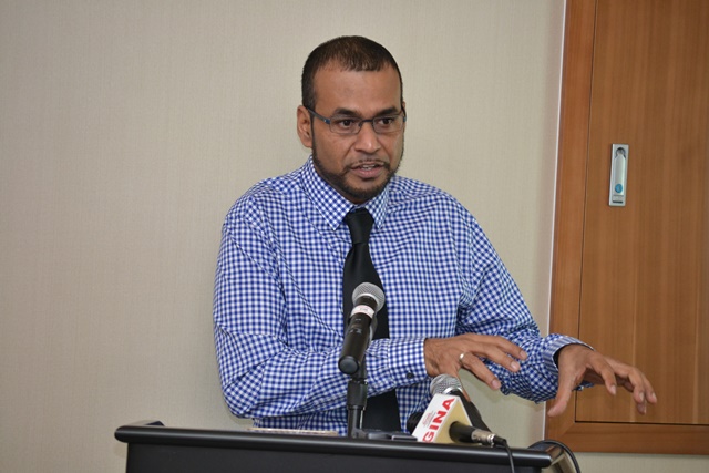 Minister of Natural Resources and the Environment, Robert Persaud, during brief remarks at the workshop