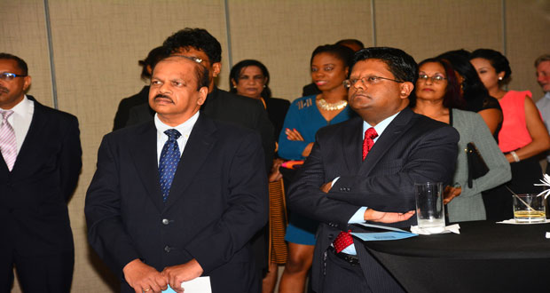 Governor of the Bank of Guyana, Dr Gobind Ganga and Finance Minister DrAshni Singh pay rapt attention