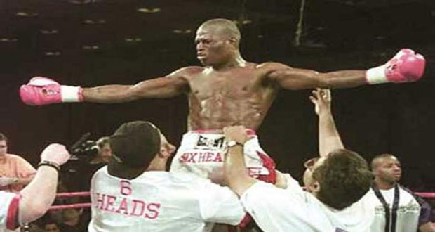 Flashback! February 17, 2001: Guyana’s Andrew ‘Six Head’ Lewis celebrates after knocking out James Page in Round 7 to win the WBA welterweight title.