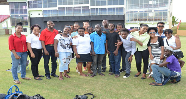Young actors pose for the camera on day two of the rehearsals for the official Inauguration ceremony of President David Granger at the Guyana National Stadium on May 26