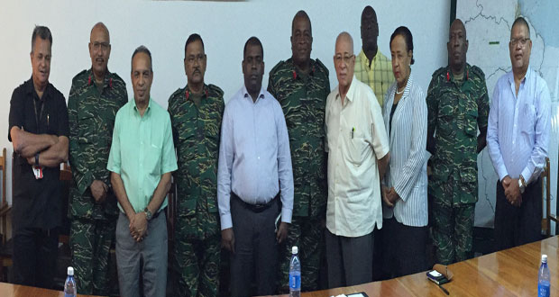 PSC representatives and members of the Joint Services. Fifth from left is PSC Chairman, Ramesh Persaud and Brigadier Mark Phillips