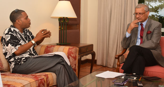 Chronicle’s Gary Eleazar interviewing Commonwealth Secretary-General Kamalesh Sharma late yesterday in the Queen Elizabeth Suite of the Guyana Pegasus hotel (Photo by Samuel Maughn)