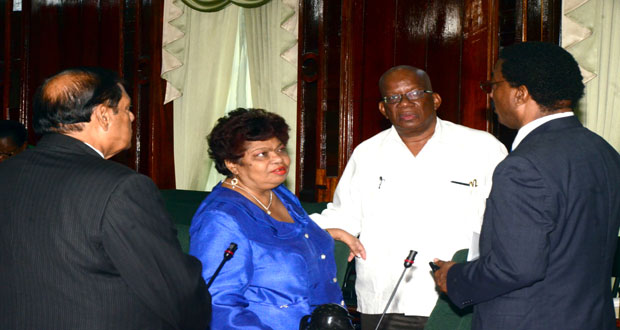 Attorney General and Minister of Legal Affairs, Basil Williams, in conversation with Prime Minister Moses Nagamootoo, Social Cohesion Minister Amna Ally, and Finance Minister Winston Jordan