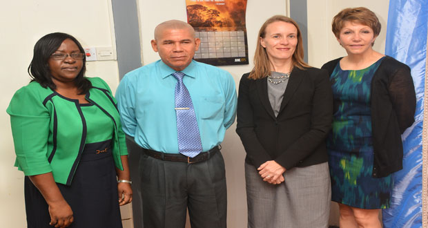 From left: Minister within the Ministry of Public Health, Dr. Karen Cummings, Minister of Public Health, Dr. George Norton, Canadian High Commissioner, Nicole Giles and Dr. Debra Isaac yesterday in the Minister of Public Health’s Office