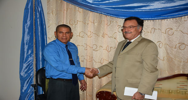 Health Minister, Dr George Norton and Argentine Ambassador to Guyana, Mr Luis Martino following their meeting yesterday