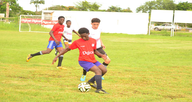 Part of the action between St Winefride’s and North Georgetown at the Ministry of Education ground. (Adrian Narine photo)