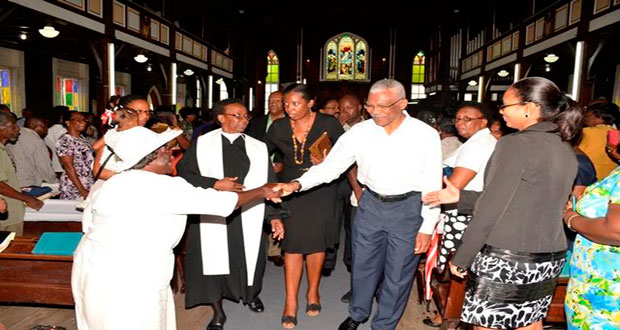 President David Granger being greeted by a parishioner at the St Andrew's Kirk, on High Street and Brickdam after fellowshipping there with members of the Guyana Public Service Union (GPSU) to mark the start of their 92nd Anniversary celebrations (Photo courtesy of GINA)