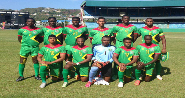 The ‘Golden Jaguars’ pose prior to kickoff against St Vincent and the Grenadines yesterday.