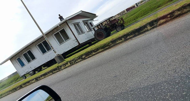 IT never ceases to amaze how an entire house could be moved from one place to another in such a manner. The same thought must have occurred to the cameraman yesterday around 16:00hrs when he came across this novelty heading east on the Rupert Craig Highway, just before the University of Guyana turn (Photo courtesy Isaac Bunbury)