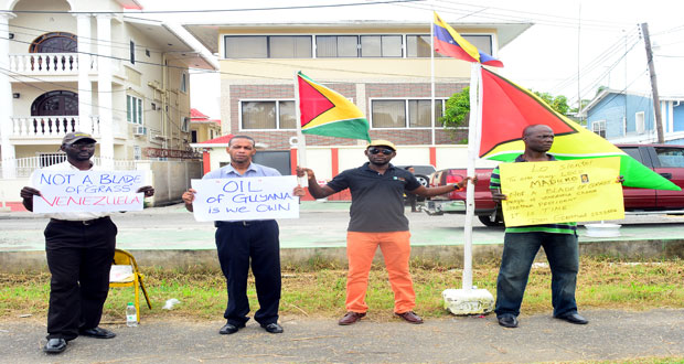 Protestors outside the Venezuelan Embassy yesterday (Photo by Samuel Maughn)