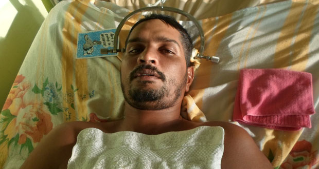 Rajesh Ragbeer who is suffering spinal injury after being hit by a speeding car one month ago at the corner of Sheriff and Duncan Streets