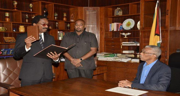 Legal Affairs Minister, Mr. Basil Williams taking the oath as Attorney General before President David Granger