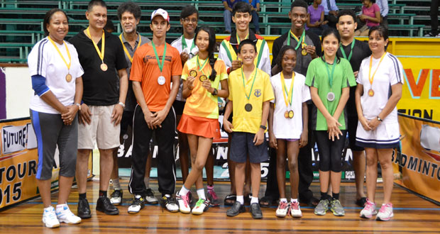 Winners of the GOA badminton tourney pose with their prizes.