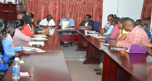 Minister of Communities Ronald Bulkan, Permanent Secretary, Emil Mc Garrell, Deputy Permanent Secretary, Abena Moore and staff of the departments for Local Government and Regional Development