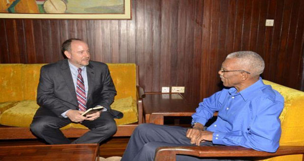 President David Granger during his meeting with Field Office Director of the Carter Center, Jason Calder, at the Ministry of the Presidency.